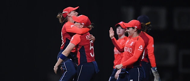 Danielle Wyatt of England(L) celebrates as she runs out Radha Yadav of India during the ICC Women's World T20 2018 Semi-Final match between England and India at Sir Viv Richards Cricket Ground on November 22, 2018 in Antigua, Antigua and Barbuda.