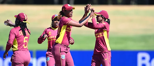 Hayley Matthews of the West Indies celebrates with teammate Karishma Ramharack