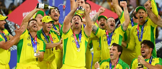 Mitchell Marsh of Australia lifts the ICC Men's T20 World Cup Trophy following during the ICC Men's T20 World Cup final match between New Zealand and Australia at Dubai International Stadium on November 14, 2021 in Dubai, United Arab Emirates.