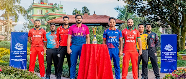 The eight captains with the trophy ahead of the ICC Men’s T20 World Cup Asia Qualifier Final in Nepal.