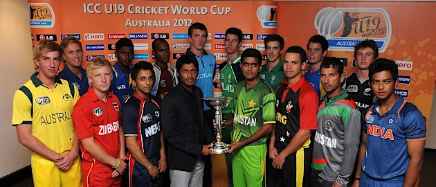 Team captains pose with the trophy at the ICC U19 Men's Cricket World Cup 2012