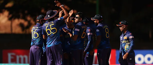 Mahesh Theekshana of Sri Lanka celebrates with teammates after dismissing Jack Jarvis of Scotland by lbw during the ICC Men's Cricket World Cup Qualifier Zimbabwe 2023 match between the Sri Lanka and Scotland at Queen’s Sports Club on June 27, 2023.