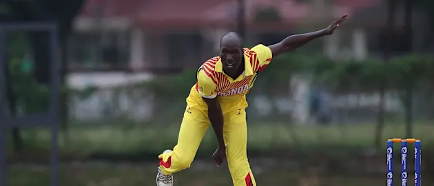 Frank Nsubuga of Uganda bowls during a WCL Division 4 match against Denmark