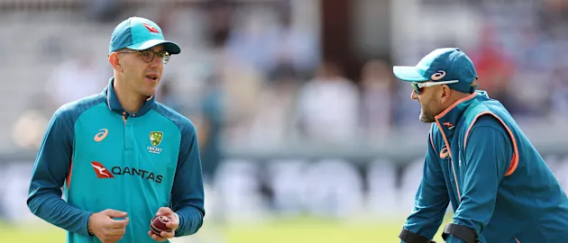 Nathan Lyon (R) chatting with Todd Murphy (L) before the start of the third day's play at Lord's