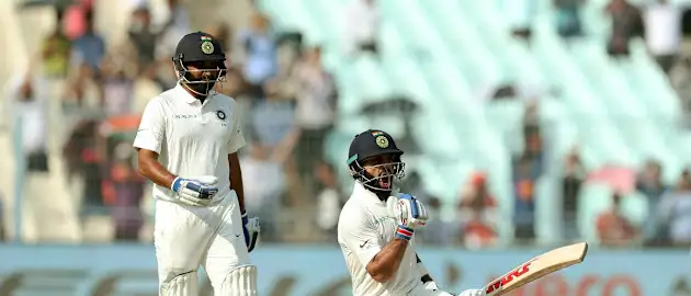 Virat Kohli has edged Warner to take fifth position in the ICC Test rankings after completing his 50th international century in the first match of a three-Test series against Sri Lanka