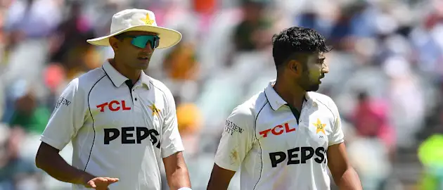 
Pakistan's Mohammad Abbas (L) and Pakistan's Khurram Shahzad (R) react as they walk on the field during the first day of the second international Test cricket match between South Africa and Pakistan at Newlands stadium in Cape Town on January 3, 2025. 