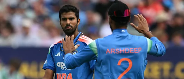 India's Arshdeep Singh (R) celebrates with India's Washington Sundar (L) after the latter took the catch to dismiss England's Jacob Bethell
