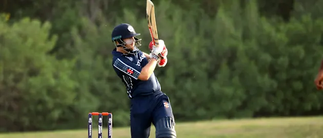 Matthew Cross bats against Oman