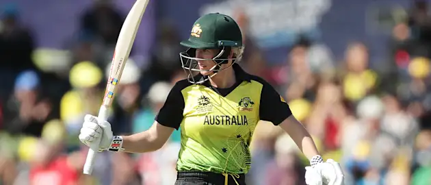 Beth Mooney of Australia celebrates and acknowledges the crowd after hitting a half century during the ICC Women's T20 Cricket World Cup match between Australia and New Zealand at Junction Oval on March 02, 2020 in Melbourne, Australia.