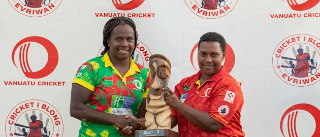 Vanuatu team captain, Selina Solman, with women's cricket pioneer Amelia Lawac