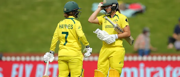 Rachael Haynes and Ellyse Perry of Australia chat between overs during the 2022 ICC Women's Cricket World Cup match between Australia and West Indies at Basin Reserve on March 15, 2022 in Wellington, New Zealand.