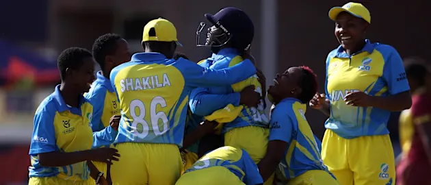Players of Rwanda celebrate following the ICC Women's U19 T20 World Cup 2023 Super 6 match between West Indies and Rwanda