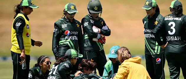 Dar is treated my medical staff after being struck in the face // Getty Images