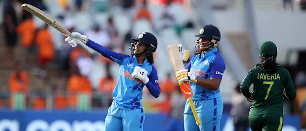 Jemimah Rodrigues and Richa Ghosh of India celebrate following the ICC Women's T20 World Cup group B match between India and Pakistan at Newlands Stadium on February 12, 2023 in Cape Town, South Africa.