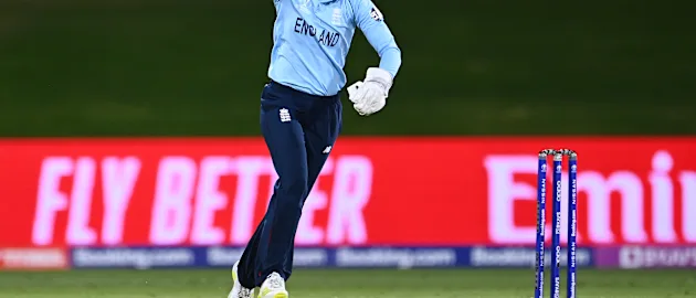 Amy Jones of England celebrates after catching out Mignon du Preez of South Africa during the 2022 ICC Women's Cricket World Cup match between South Africa and England at Bay Oval on March 14, 2022 in Tauranga, New Zealand.