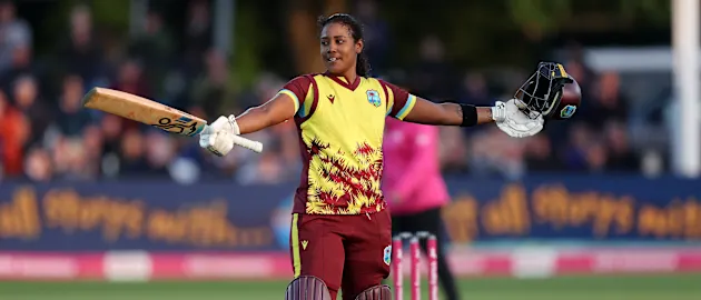Hayley Matthews celebrates her century against England in the first T20I of the series