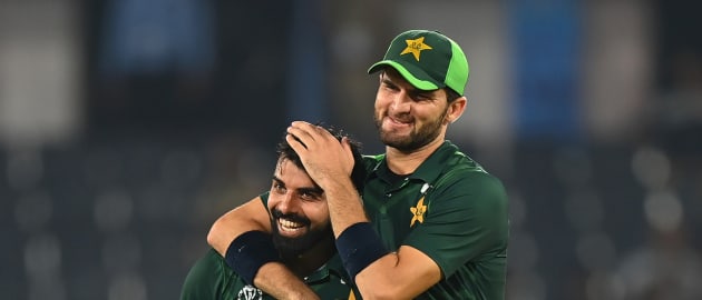 Fakhar Zaman of Pakistan celebrates with teammate Shaheen Shah Afridi after dismissing Vikramjit Singh of Netherlands