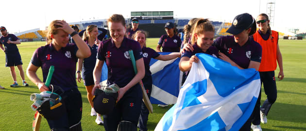 Players of Scotland celebrate victory following the ICC Women's T20 World Cup Qualifier 2024 Semi-Final match between Ireland and Scotland at Zayed Cricket Stadium on May 05, 2024 in Abu Dhabi, United Arab Emirates.