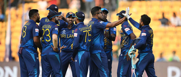 Kusal Mendis of Sri Lanka celebrates the run out wicket of Adil Rashid of England during the ICC Men's Cricket World Cup India 2023 between England and Sri Lanka