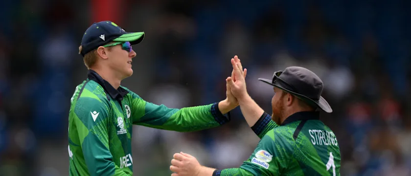 Harry Tector of Ireland celebrates with team mate Paul Stirling after catching Imad Wasim of Pakistan 