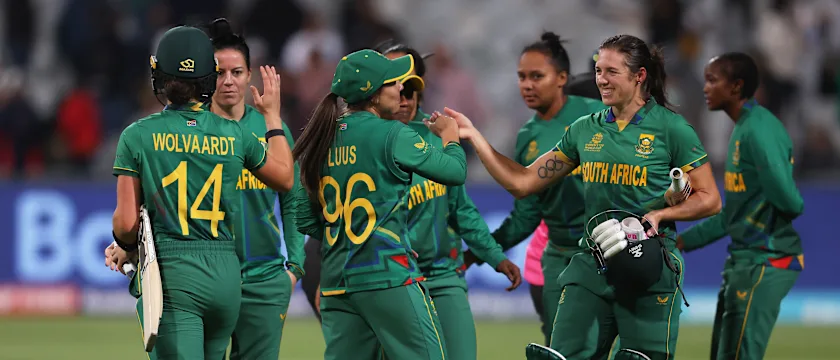 Players of South Africa celebrate following the ICC Women's T20 World Cup group A match between South Africa and Bangladesh at Newlands Stadium on February 21, 2023 in Cape Town, South Africa.