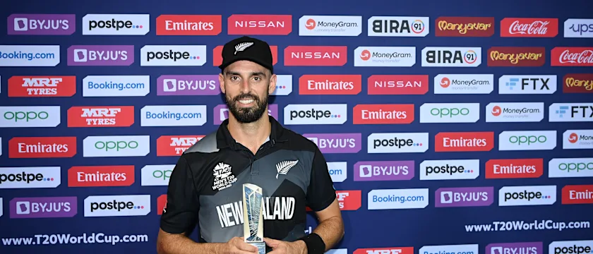 Daryl Mitchell of New Zealand poses after being named Player of the Match following the ICC Men's T20 World Cup semi-final match between England and New Zealand at Sheikh Zayed stadium on November 10, 2021 in Abu Dhabi, United Arab Emirates.