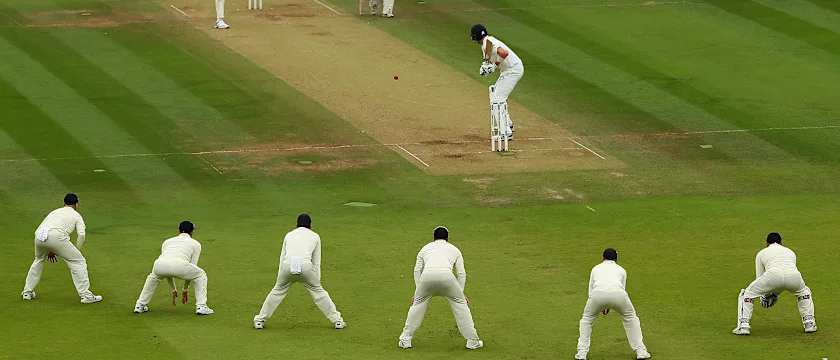 Broad bowling to a packed slip cordon