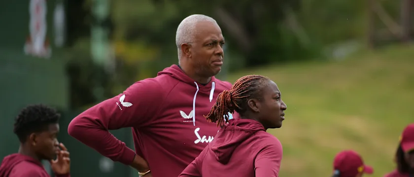 Courtney Walsh, head coach of the West Indies and Stafanie Taylor of the West Indies look on prior to the 2022 ICC Women's Cricket World Cup match between Australia and West Indies at Basin Reserve on March 15, 2022 in Wellington, New Zealand.
