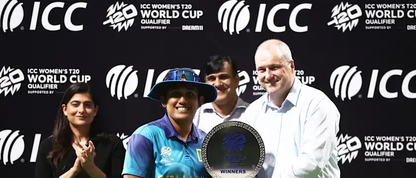 Chamari Athapaththu of Sri Lanka poses with the ICC Women's T20 World Cup Qualifier 2024 Trophy following the ICC Women's T20 World Cup Qualifier 2024 Final match between Scotland and Sri Lanka at Zayed Cricket Stadium on May 07, 2024 in Abu Dhabi, United Arab Emirates.