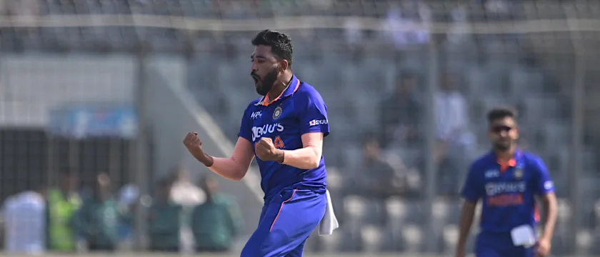 Mohammed Siraj (L) celebrates the wicket of Bangladesh's Anamul Haque (not pictured) during the second one-day international (ODI) cricket match between Bangladesh and India at the Sher-e-Bangla National Cricket Stadium in Dhaka on December 7, 2022.