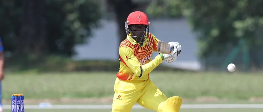 Brian Masaba of Uganda plays a shot