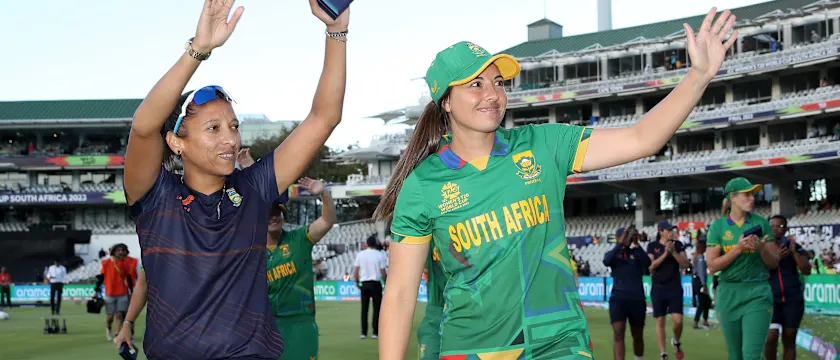 Shabnim Ismail and Sune Luus of South Africa interacts with the crowd following the ICC Women's T20 World Cup Final match between Australia and South Africa at Newlands Stadium on February 26, 2023 in Cape Town, South Africa.