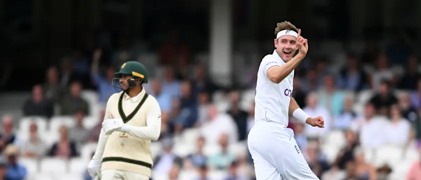 Stuart Broad celebrates after taking the wicket of Usman Khawaja