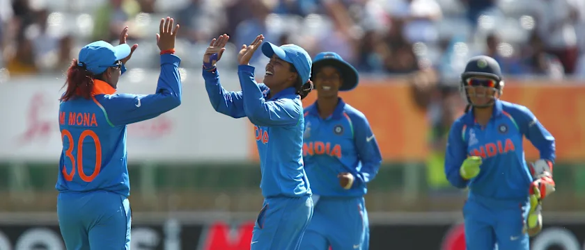 Ekta Bisht of India celebrates with Mona Meshram of India after bowling out Diana Baig of Pakistan.