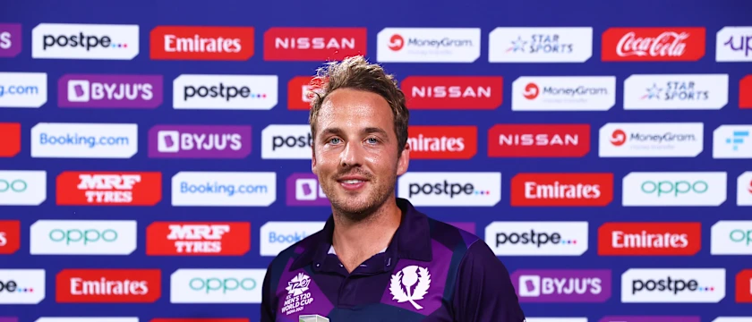 Josh Davey of Scotland poses after being named Player of the Match following the ICC Men's T20 World Cup match between Bangladesh and PNG at Oman Cricket Academy Ground on October 21, 2021 in Muscat, Oman.