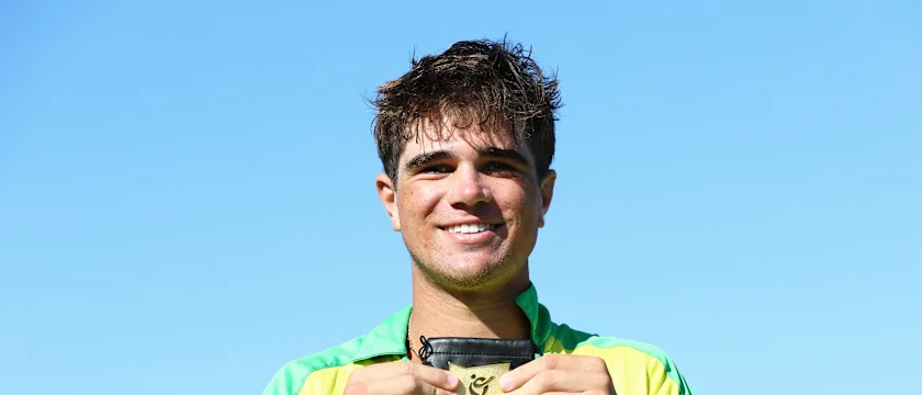 Teague Wyllie of Australia poses after being named Player of the Match following the ICC U19 Men's Cricket World Cup match between Australia and Scotland at Conaree Sports Club on January 19, 2022 in Basseterre, Saint Kitts and Nevis.