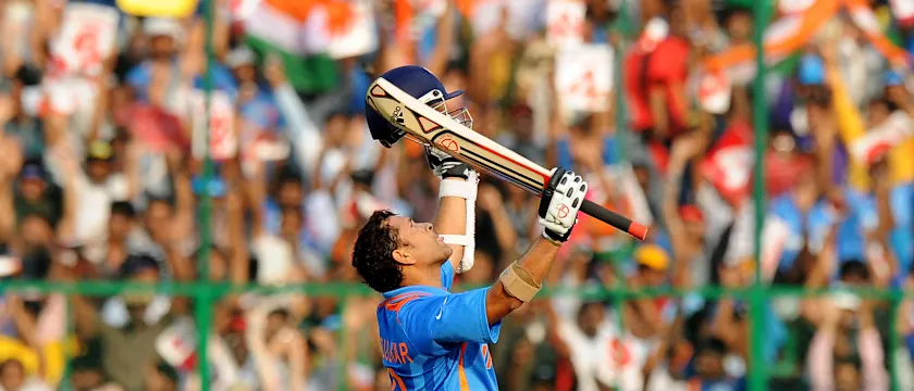 Sachin Tendulkar celebrates his century against England.