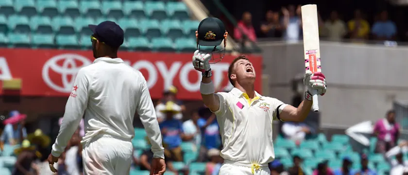 Warner looked to the heavens after bringing up his century