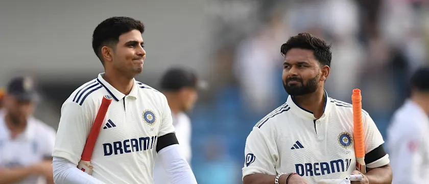 Shubman Gill and Rishabh Pant walk back after Day 1 at Leeds
