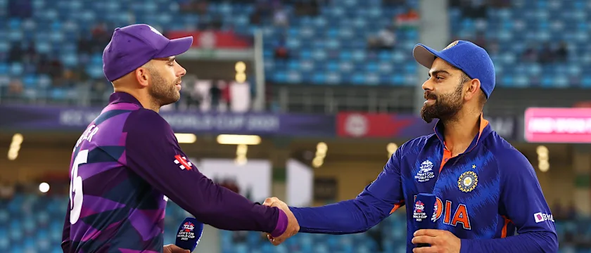 Kyle Coetzer of Scotland and Virat Kohli of India shake hands during the ICC Men's T20 World Cup match between India and Scotland at Dubai International Cricket Ground on November 05, 2021 in Dubai, United Arab Emirates.