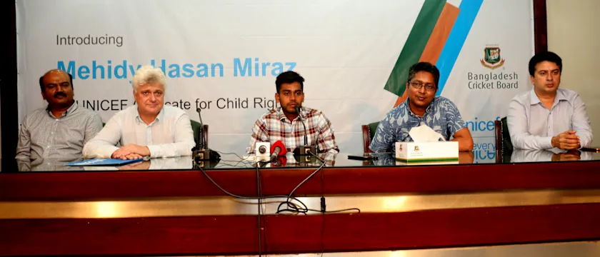 Miraz sits before the press to announce his role with UNICEF