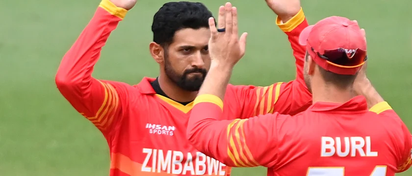 Sikandar Raza of Zimbabwe celebrates after taking the wicket of David Warner of Australia during game one of the One Day International Series between Australia and Zimbabwe 1920x1080