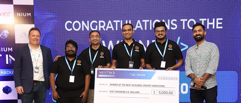 The winning team Fanisko with ICC's Finn Bradshaw and Dinesh Karthik