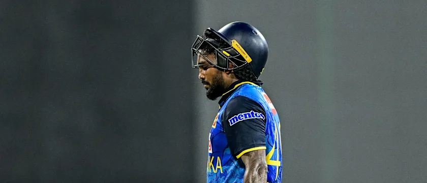 Wanindu Hasaranga walks back to the pavilion after his dismissal during the second ODI against Bangladesh