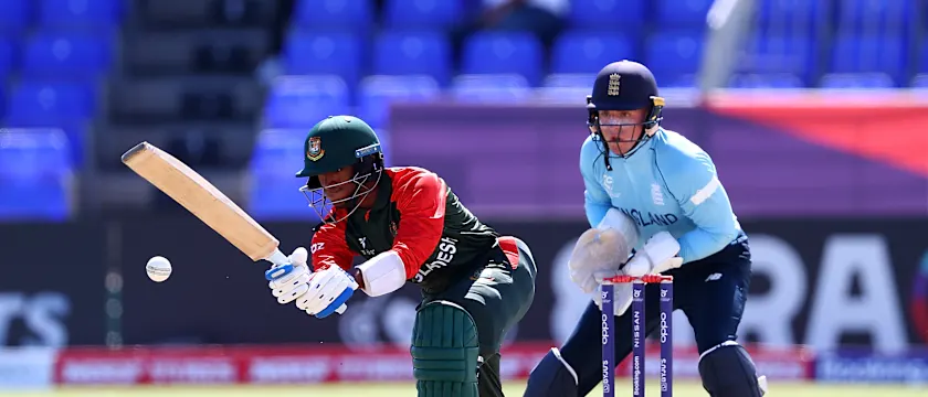 Ripon Mondol of Bangladesh plays a shot ahead of Alex Horton of England during the ICC U19 Men's Cricket World Cup match between Bangladesh and England at Warner Park Sporting Complex on January 16, 2022 in Basseterre.