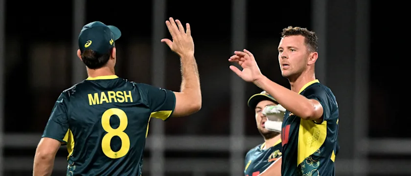 Josh Hazlewood and Mitchell Marsh celebrate a wicket