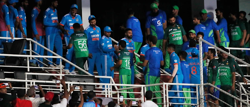 Pakistan and India players hand shake fter Match abandoned due to rain during the Asia Cup Group A match between India and Pakistan at Pallekele International Cricket Stadium on September 2, 2023 in Kandy, Sri Lanka.