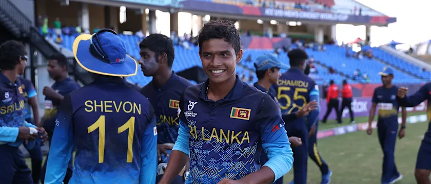 Dunith Wellalage of Sri Lanka celebrates victory during the ICC U19 Men's Cricket World Cup match between South Africa and Sri Lanka at Sir Vivian Richards Stadium on January 30, 2022 in Antigua, Antigua and Barbuda.