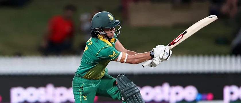 Marizanne Kapp of South Africa hits a four during the 2022 ICC Women's Cricket World Cup match between New Zealand and South Africa at Seddon Park on March 17, 2022 in Hamilton, New Zealand.