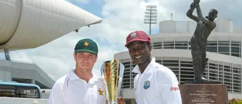 43467 Zimbabwe captain Brendan Taylor and West Indies captain Darren Sammy with the trophy